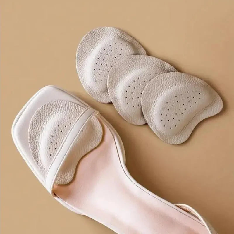 Thin forefoot cushions that sit under the ball of the foot to pad a high heel