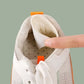 Clear adhesive anti-friction pads trimmed to fit the back of the heel