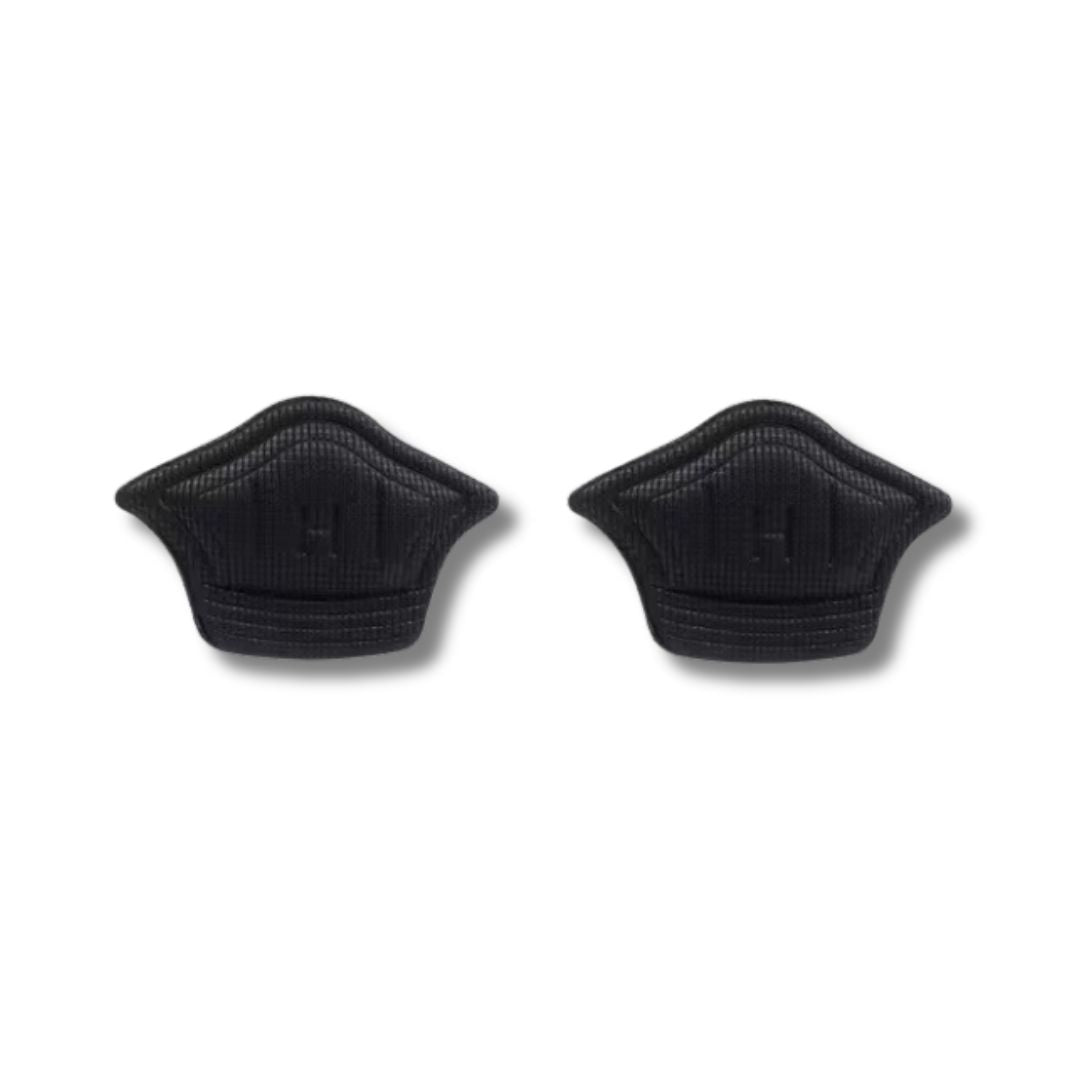 Clear adhesive anti-friction pads trimmed to fit the back of the heel