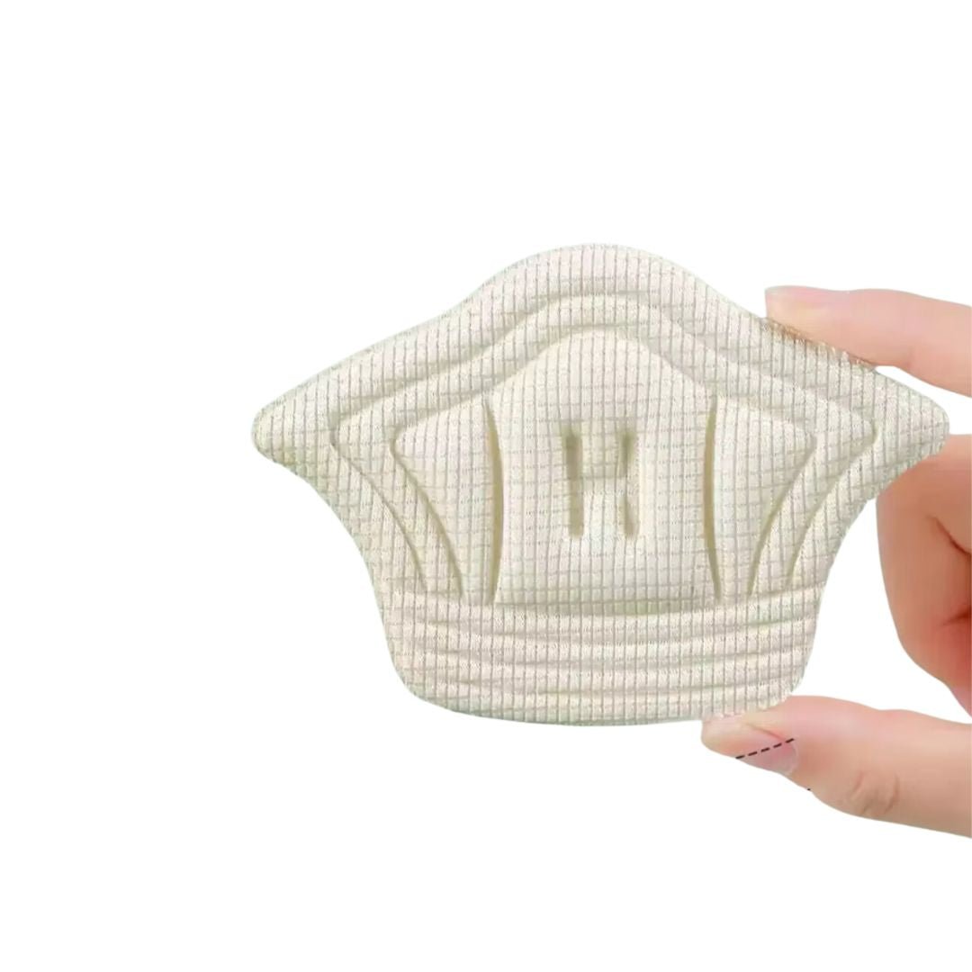 Clear adhesive anti-friction pads trimmed to fit the back of the heel