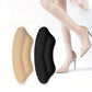 Clear adhesive heel pads stuck inside the shoe to stop rubbing at the heel