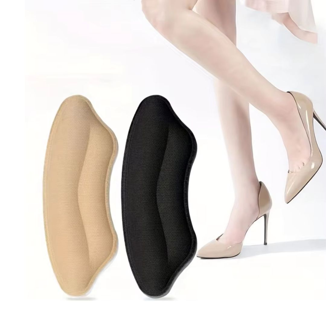 Clear adhesive heel pads stuck inside the shoe to stop rubbing at the heel