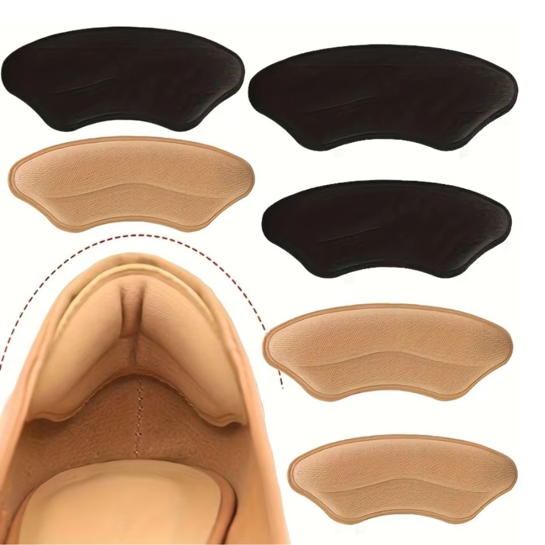 Clear adhesive heel pads stuck inside the shoe to stop rubbing at the heel