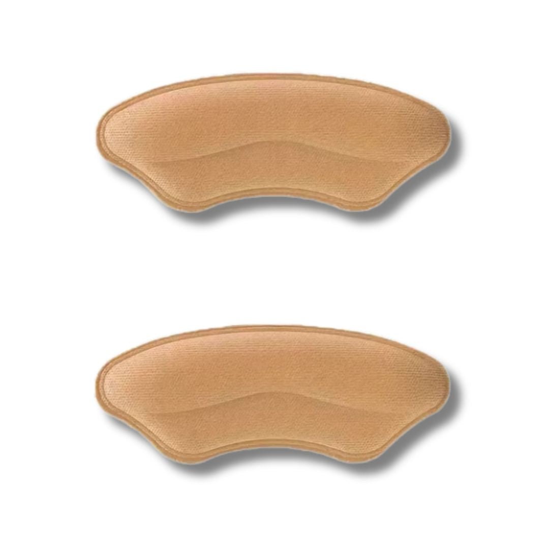 Clear adhesive heel pads stuck inside the shoe to stop rubbing at the heel