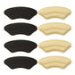 Clear adhesive heel pads stuck inside the shoe to stop rubbing at the heel