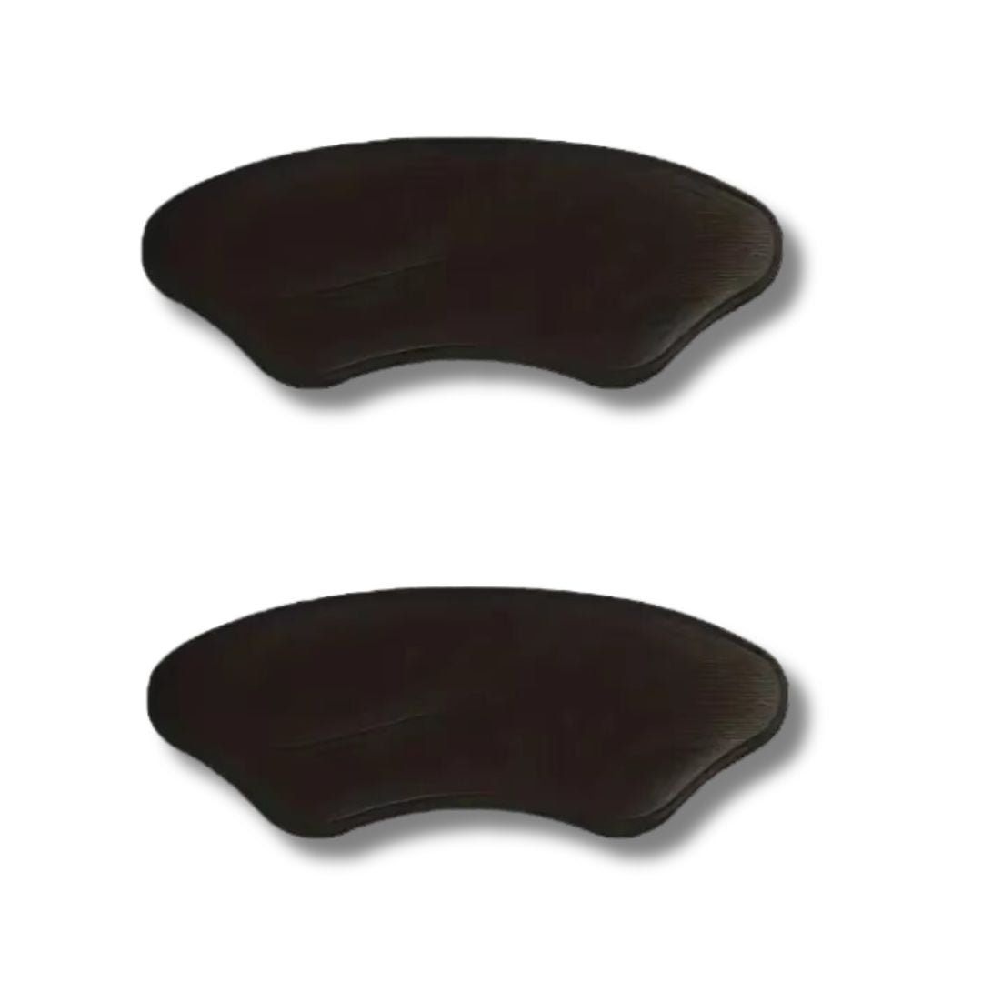 Clear adhesive heel pads stuck inside the shoe to stop rubbing at the heel