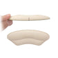 Clear adhesive heel pads stuck inside the shoe to stop rubbing at the heel