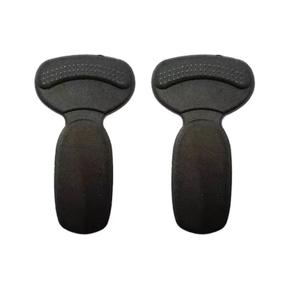 Clear anti-friction pads in black and beige, stuck inside the back of a high heel