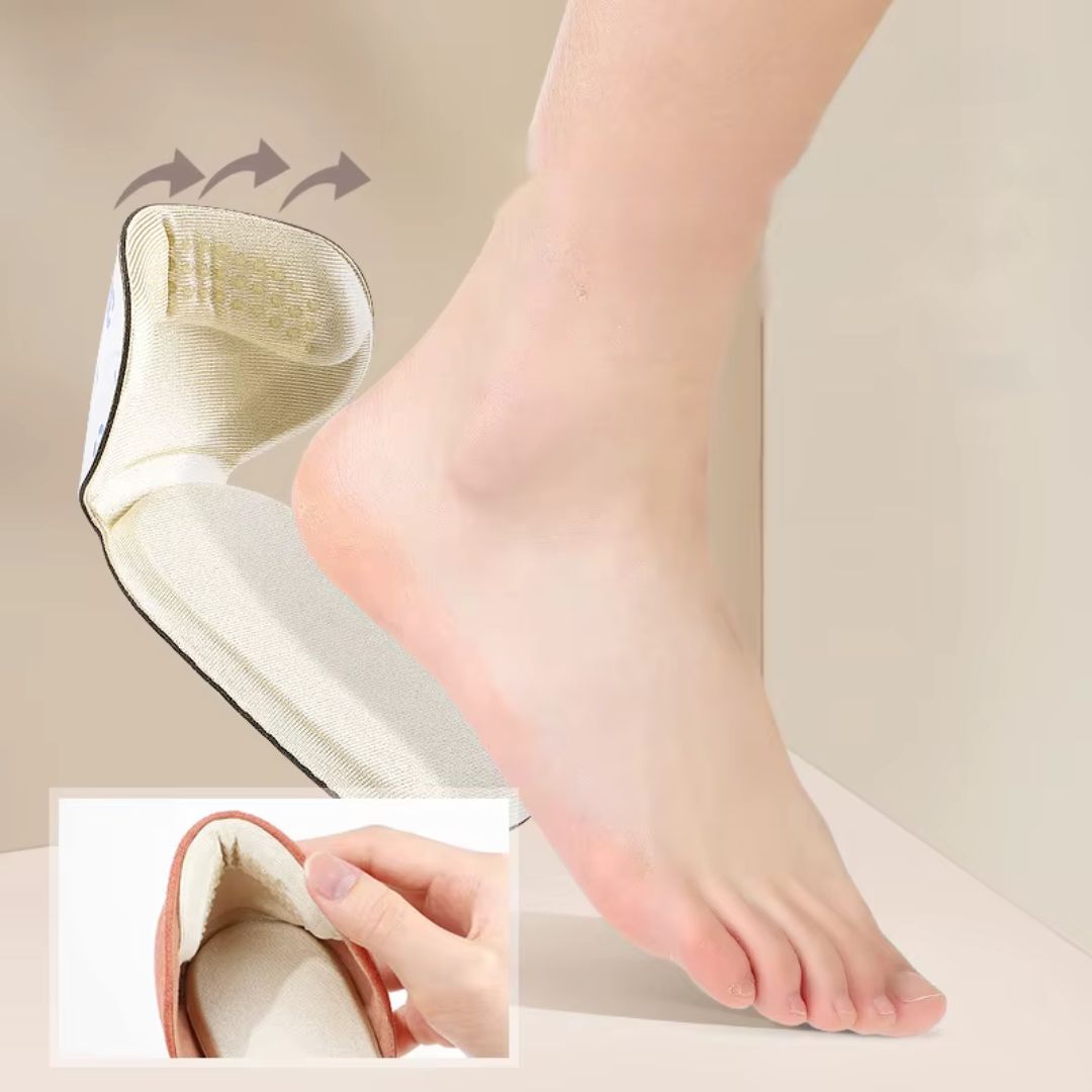 Clear anti-friction pads in black and beige, stuck inside the back of a high heel