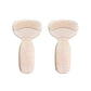 Clear anti-friction pads in black and beige, stuck inside the back of a high heel