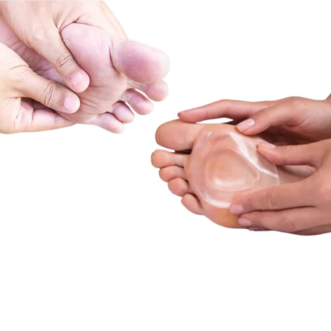 Pair of clear gel metatarsal pads cushioning the ball of the foot inside the shoe