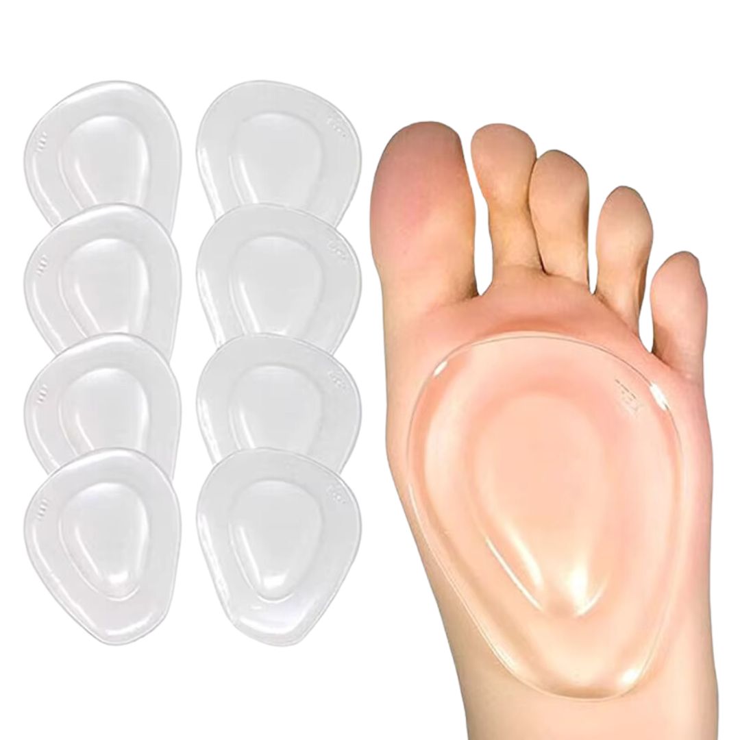Pair of clear gel metatarsal pads cushioning the ball of the foot inside the shoe