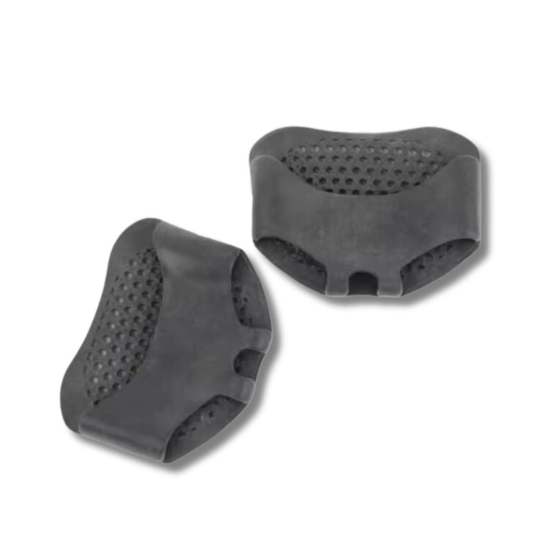 Silicone metatarsal pads in white, clear black and nude, worn under the ball of the foot