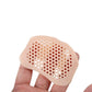 Silicone metatarsal pads in white, clear black and nude, worn under the ball of the foot
