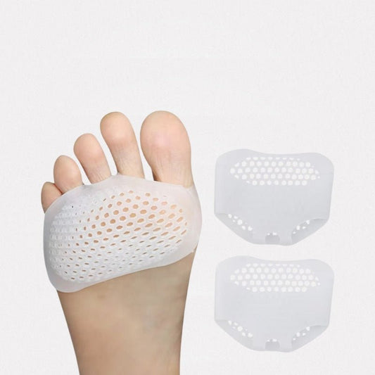 Silicone metatarsal pads in white, clear black and nude, worn under the ball of the foot
