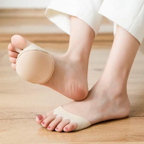 Gel metatarsal pads that stick under the ball of the foot inside high heels