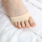 Gel metatarsal pads in nude or clear black, placed under the ball of the foot in heels