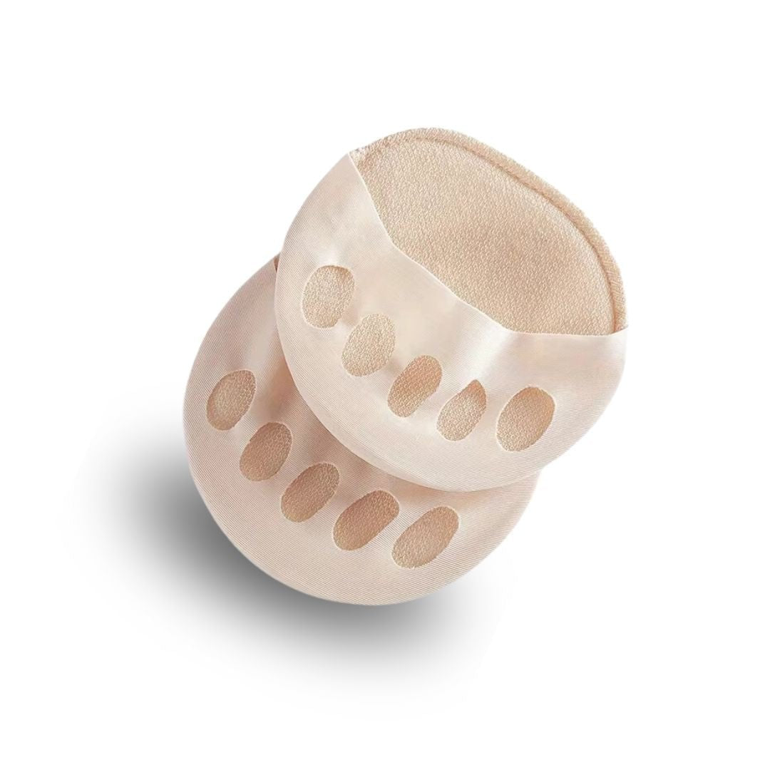 Gel metatarsal pads in nude or clear black, placed under the ball of the foot in heels