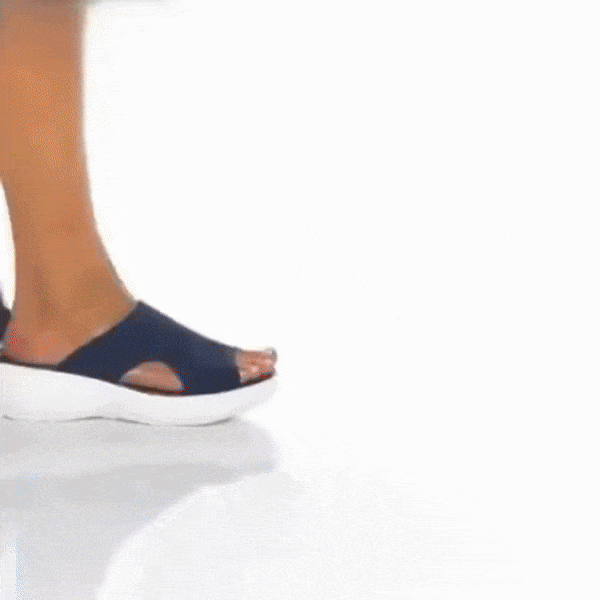 Gray wedge sandals for women with a padded footbed and an adjustable buckle