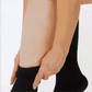 Medical compression socks rated 20 to 30 mmHg in black, white and beige, worn up to the knee
