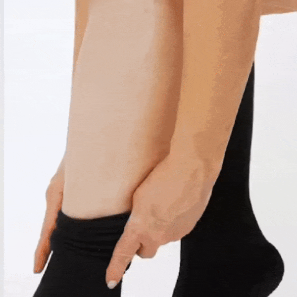 Medical compression socks rated 20 to 30 mmHg in black, white and beige, worn up to the knee