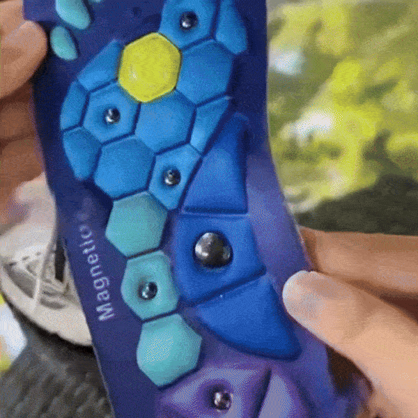Blue and red acupressure insoles covered with raised massage nubs, placed inside the shoe
