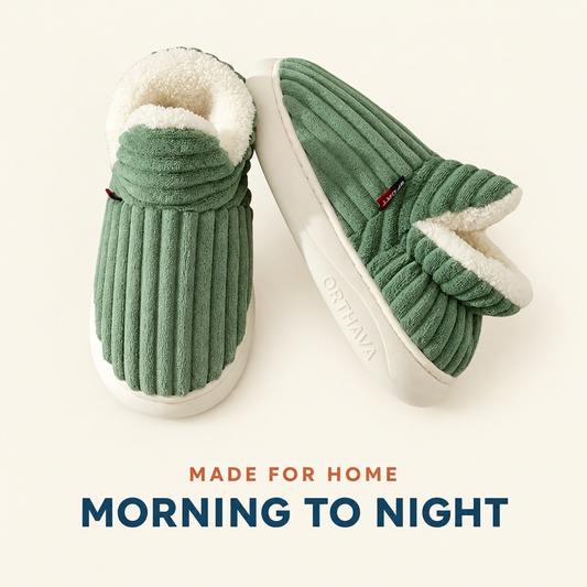 Green orthopedic winter slippers on a cream background