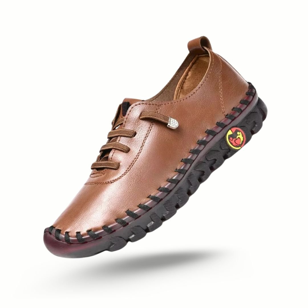 Orthopedic loafers with a slip-on upper and cushioned sole, in black, brown, white and red