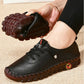 Orthopedic loafers with a slip-on upper and cushioned sole, in black, brown, white and red