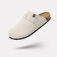 Suede leather mules open at the heel on a cork and leather sole, in taupe, black and navy
