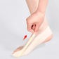 Ultra-thin corrector sock that wraps the big toe and stays hidden inside a shoe