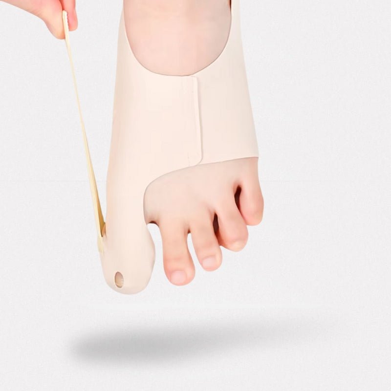 Ultra-thin corrector sock that wraps the big toe and stays hidden inside a shoe