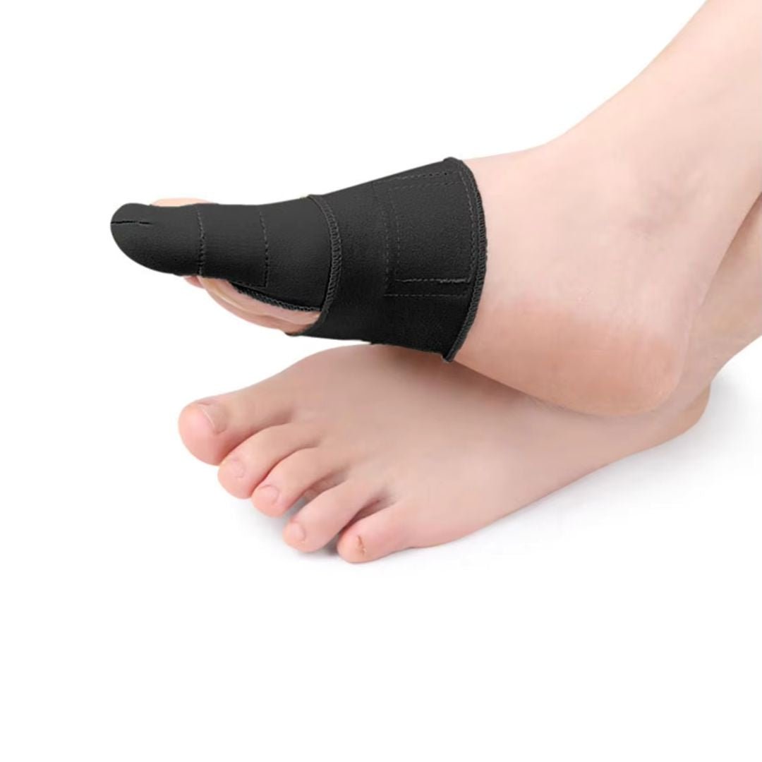 Hypoallergenic bunion corrector in nude or clear black, worn over the big toe joint