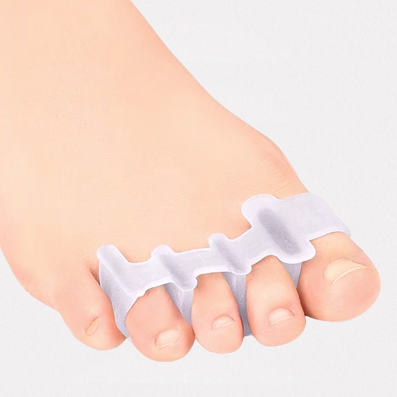 Toe straightener slipped under the claw toes to hold them flat