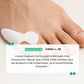 Soft silicone sleeve slipped over the little toe to cushion rubbing