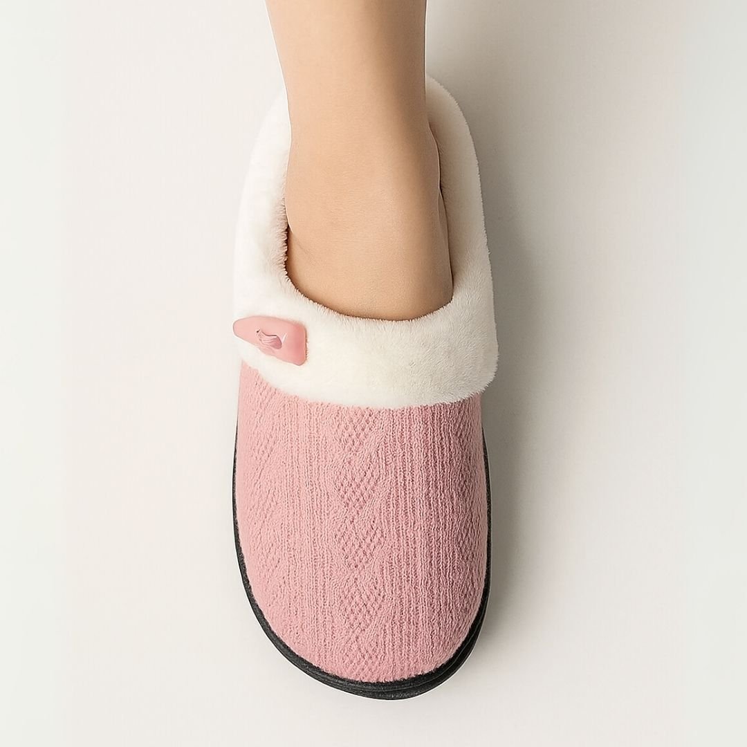 Pink orthopedic winter slippers with a closed back and contoured arch support