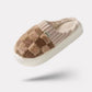 Matching pair of memory foam slippers with an open toe and a thick cushioned sole