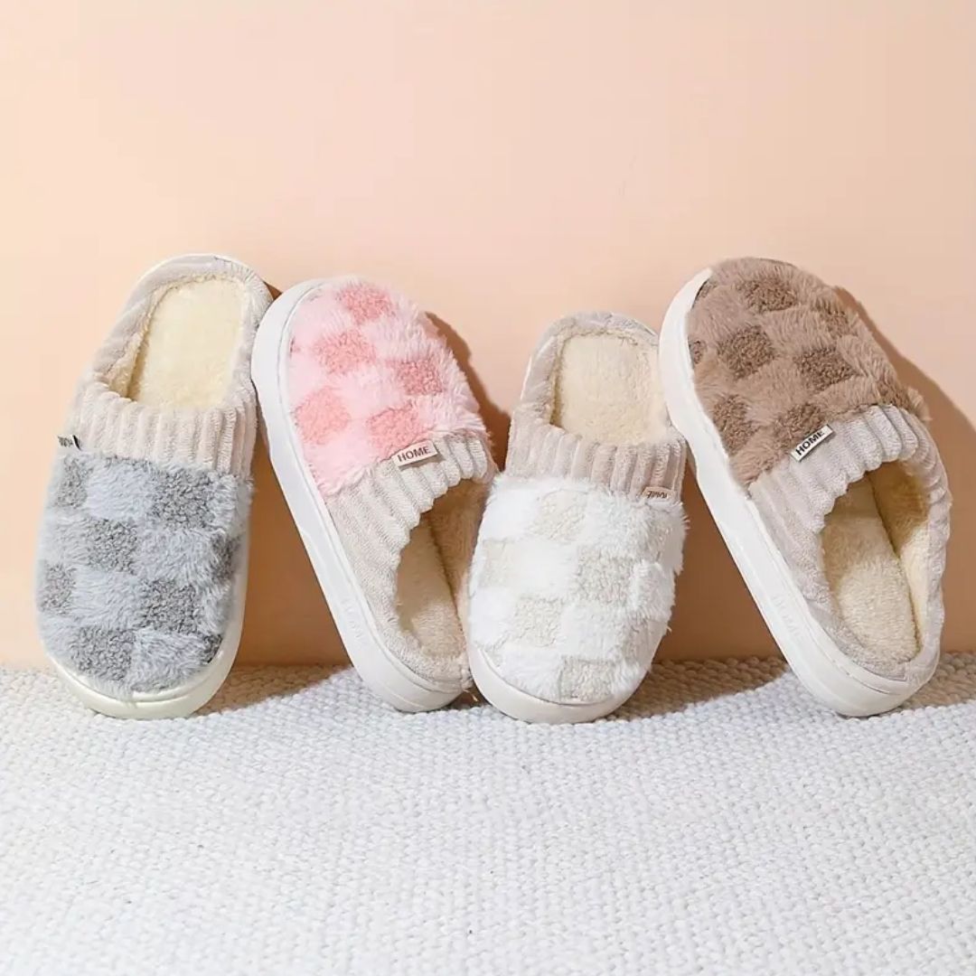 Matching pair of memory foam slippers with an open toe and a thick cushioned sole