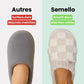 Matching pair of memory foam slippers with an open toe and a thick cushioned sole