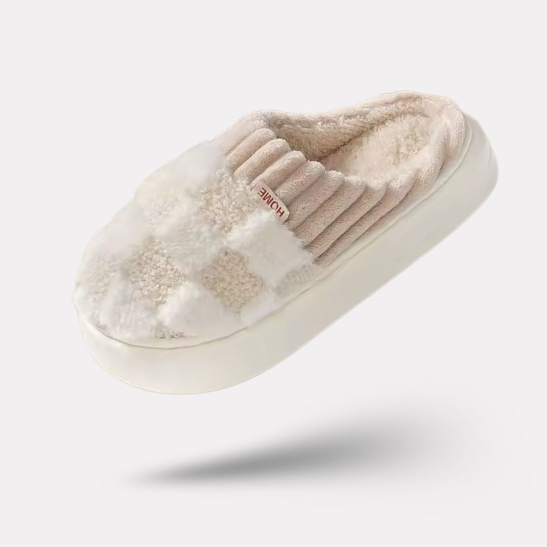 Matching pair of memory foam slippers with an open toe and a thick cushioned sole