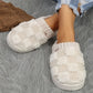 Matching pair of memory foam slippers with an open toe and a thick cushioned sole