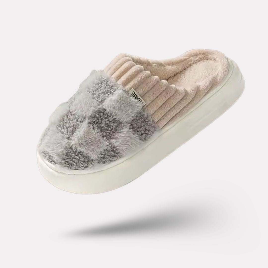 Matching pair of memory foam slippers with an open toe and a thick cushioned sole