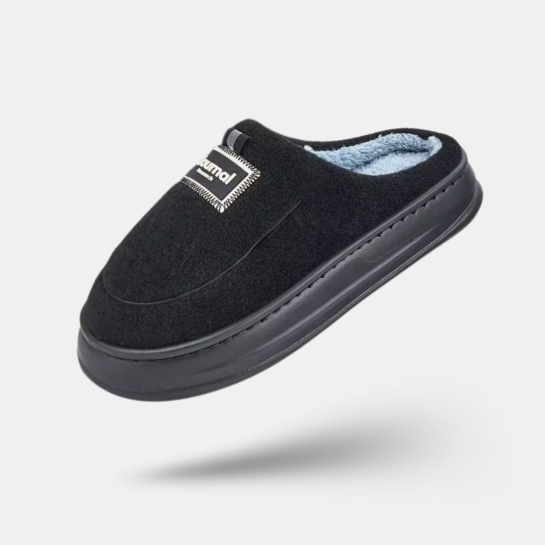 Gray extra-large memory foam slippers with a wide opening and a thick cushioned sole