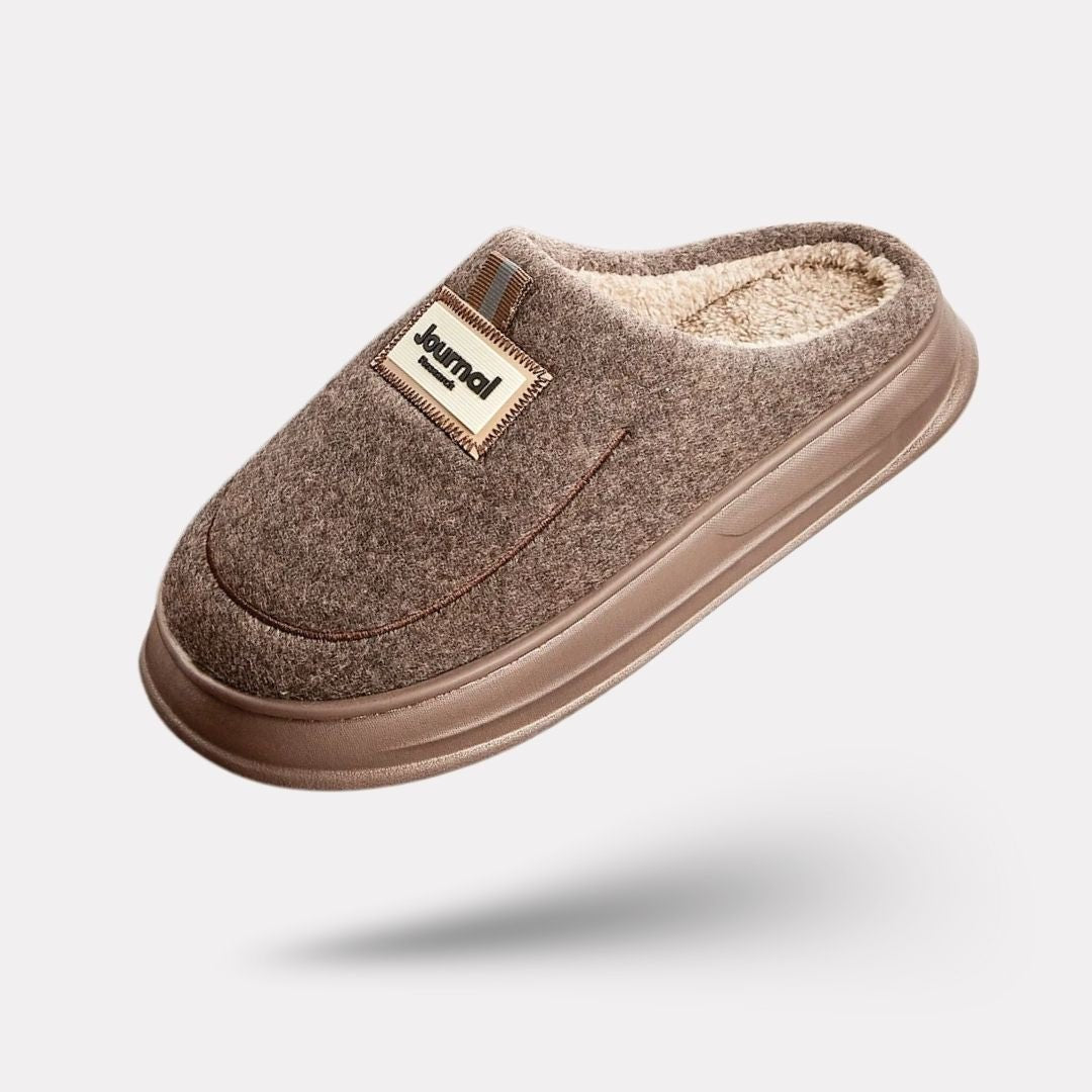 Gray extra-large memory foam slippers with a wide opening and a thick cushioned sole