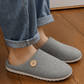 Gray orthopedic slippers with an open toe and a non-slip textured sole