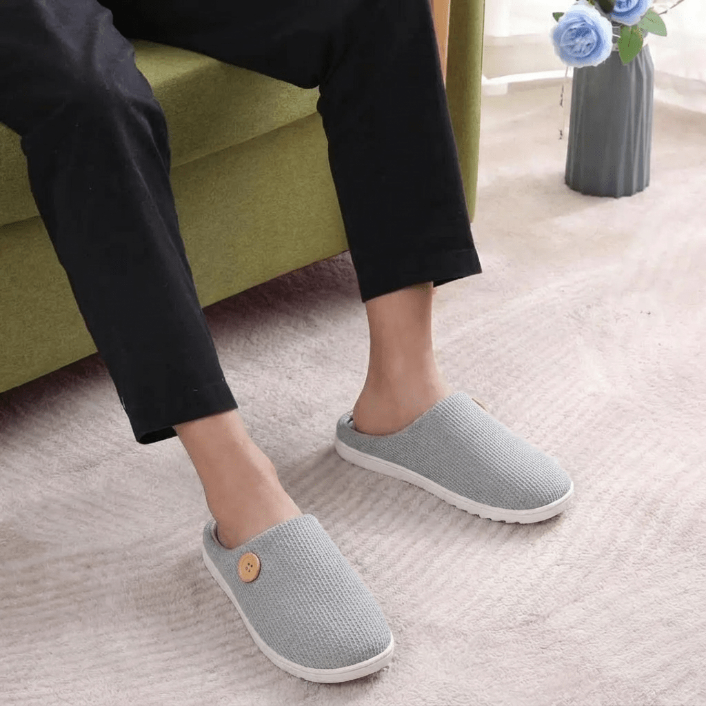 Gray orthopedic slippers with an open toe and a non-slip textured sole