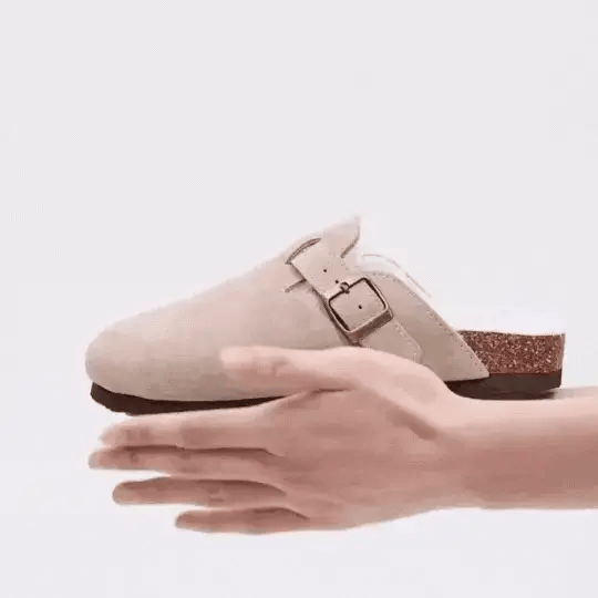 Orthopedic slippers on a cork footbed with a lined upper, in brown, black, green and khaki