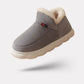 Plush lined winter slippers with a non-slip sole and a supportive footbed