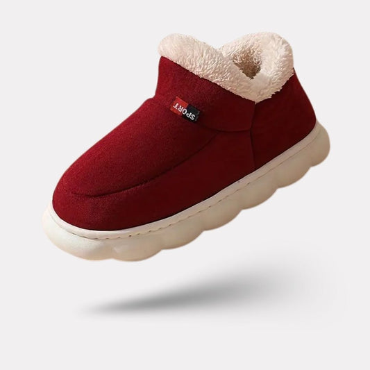 Plush lined winter slippers with a non-slip sole and a supportive footbed