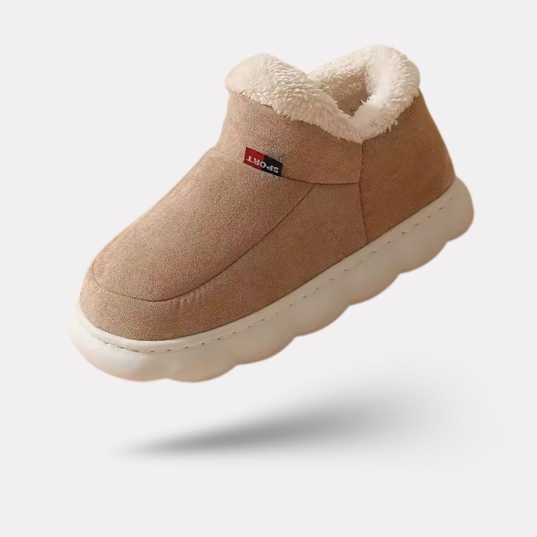Plush lined winter slippers with a non-slip sole and a supportive footbed